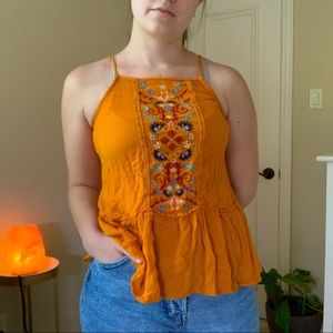 Embroidered burnt orange top